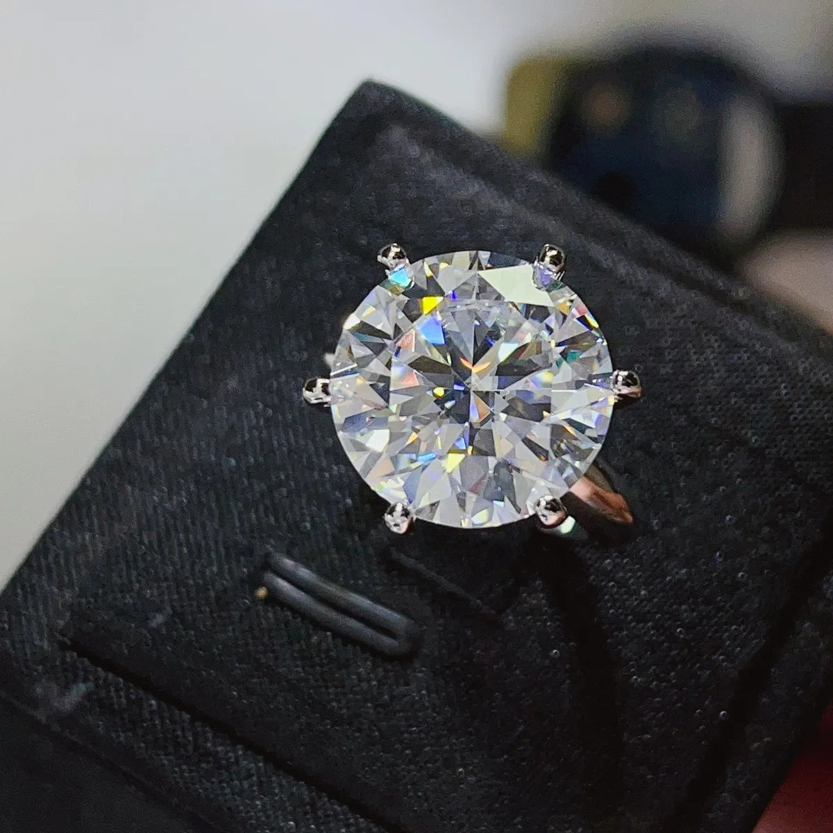 Premium moissanite ring presented in elegant gift box packaging.