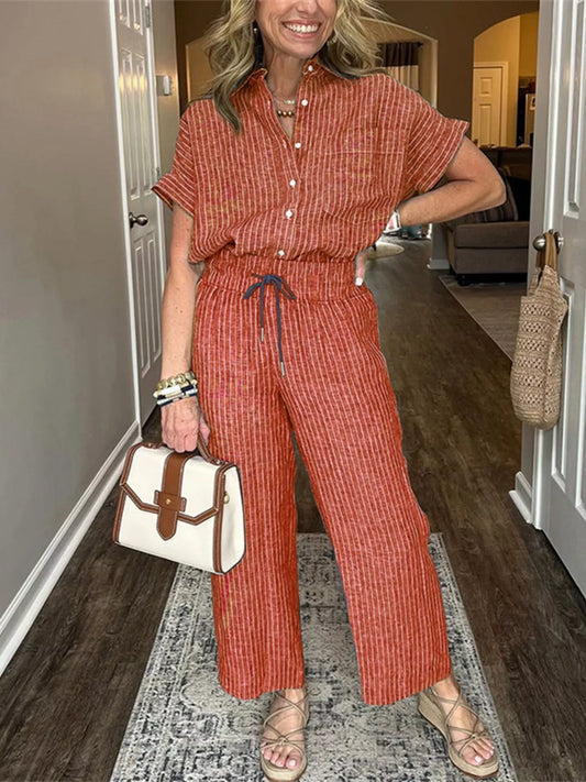 Plus size striped button-up shirt and wide leg pants set, front view.