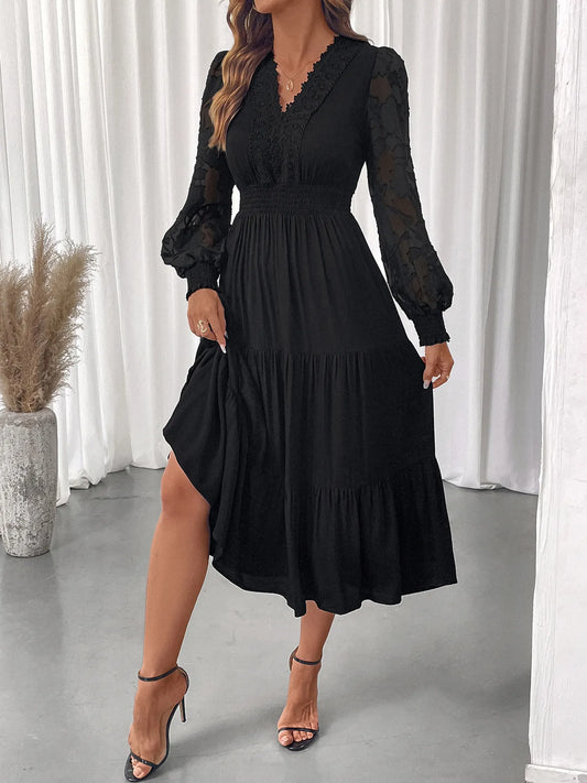 Front view of lace detail lantern sleeve tiered dress