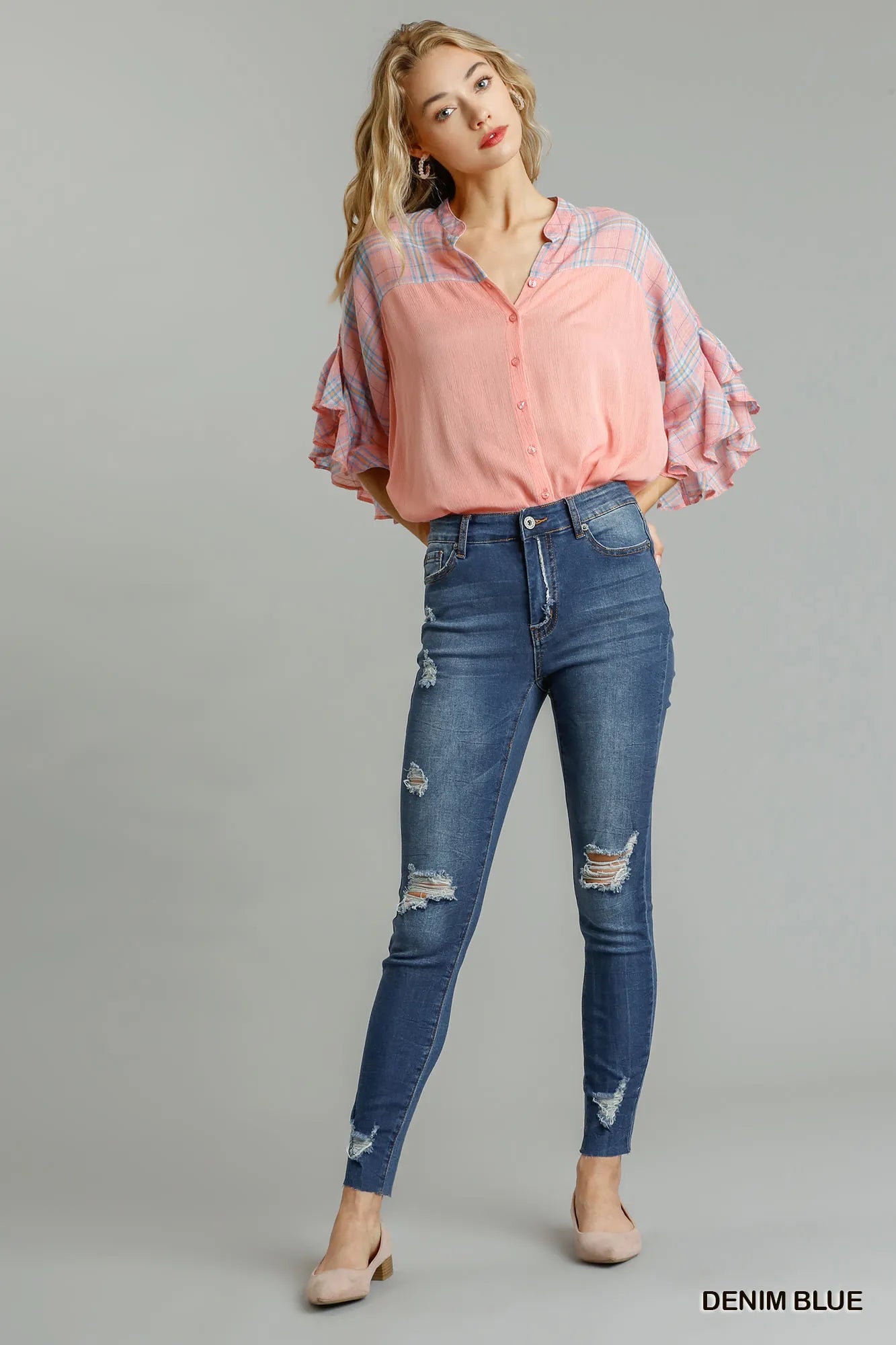 Side view of distressed skinny jeans with pockets – Imperio by Johana